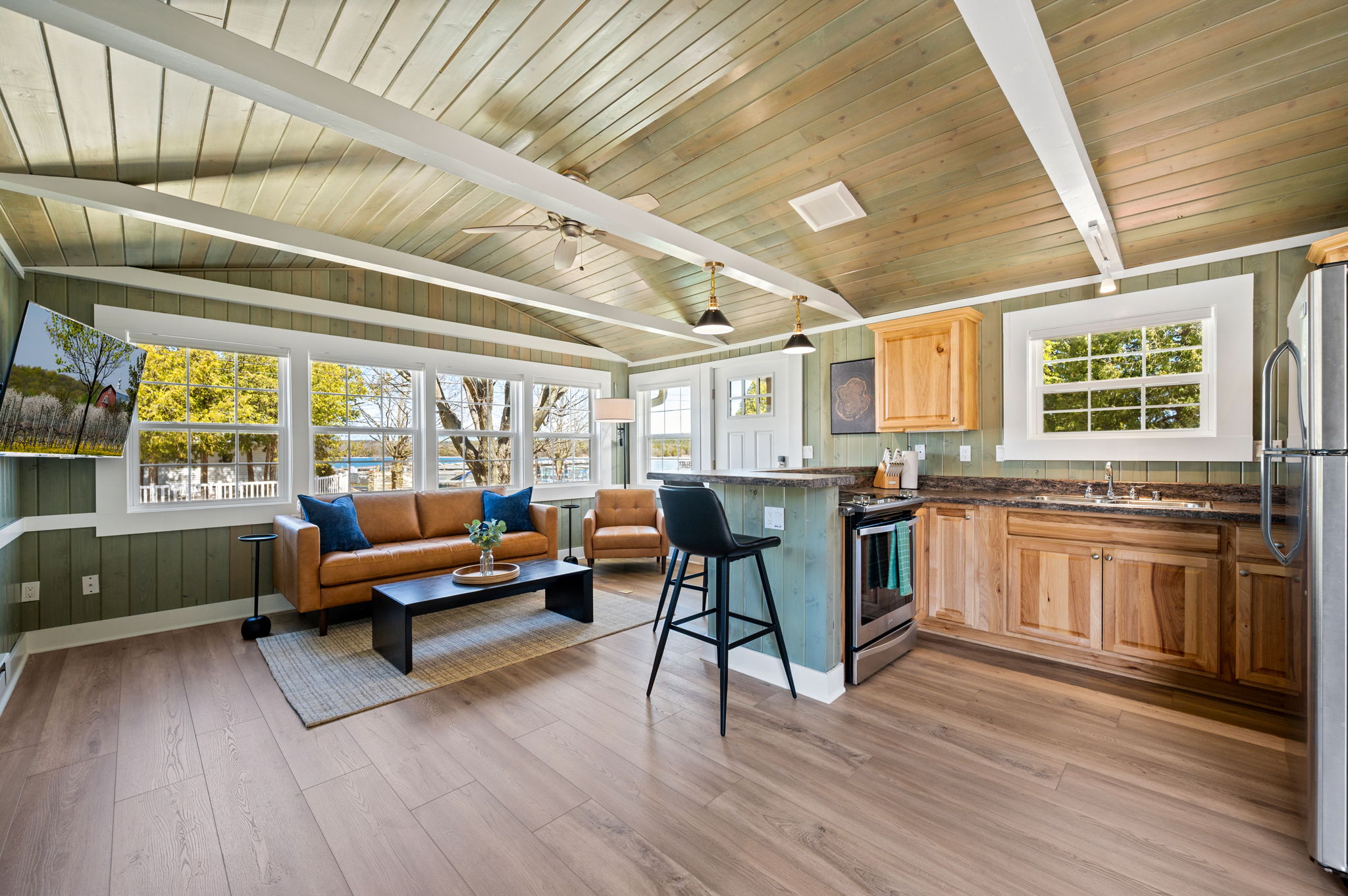 Modern rustic open-concept living room and kitchen